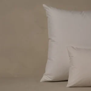 LETTO Sea Island Percale boudoir sham in ivory, square and lumbar sizes stacked.