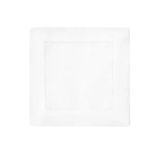 Sferra Festival white linen cocktail napkin with hemstitch border detail.