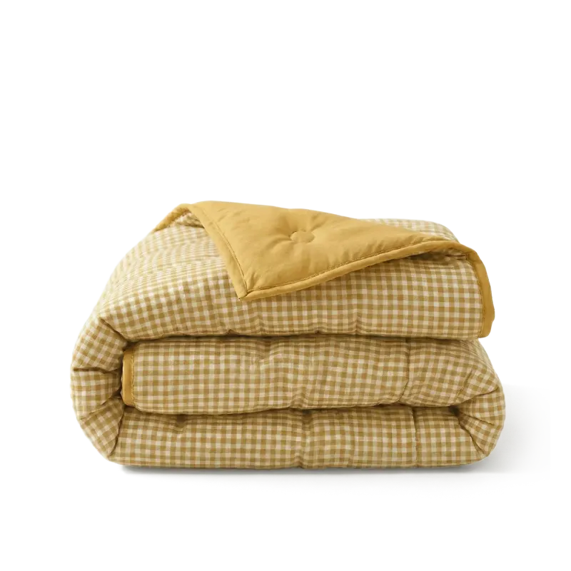 HappyBed wasbaar all season dekbed in seersucker stof en okerkleurige wafelstructuur voor frisse en hypoallergene nachten
