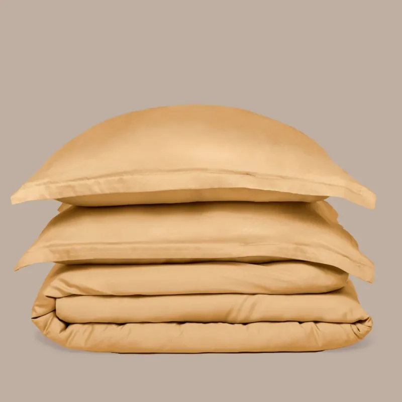 Bamboo Duvet Cover and pillowcases in Ocher Yellow, folded
