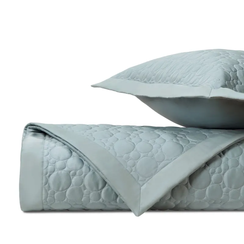 Home Treasures Globe quilted coverlet and euro sham set in mist blue circle pattern.